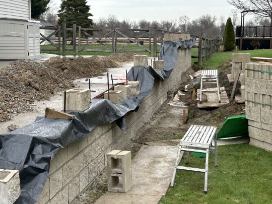 retaining wall repair before